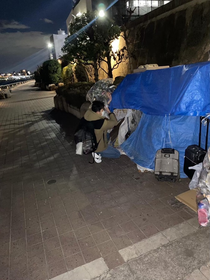 Visiting a homeless person to conduct a wellness check